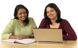 Two women at computer