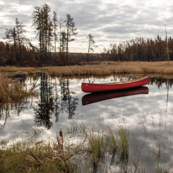 Canoe on lake water